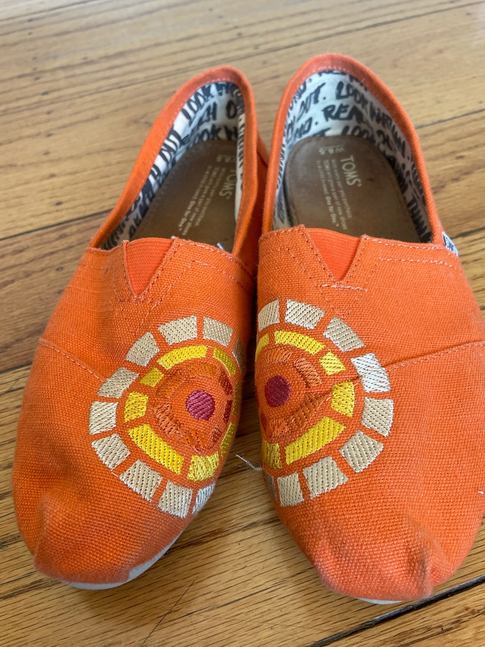 TOMS Womens Orange Canvas Alpargata Slip-Ons with Sunburst Embroidery